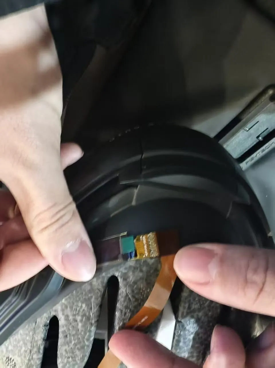 Fitting the display ribbon cable inside the helmet